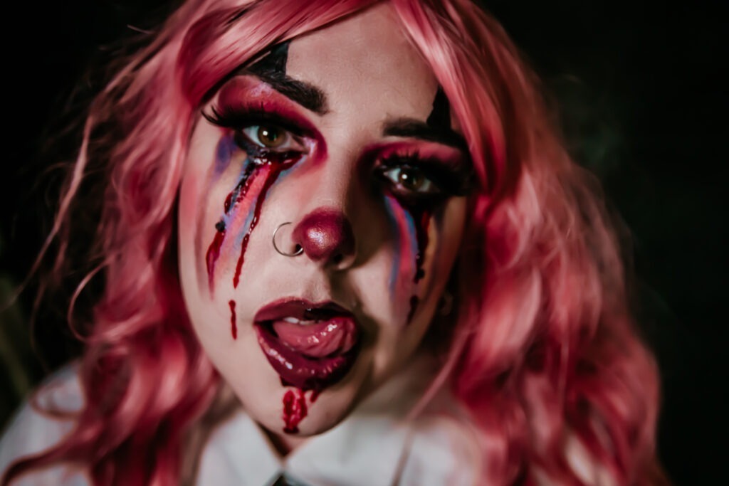 Clown makeup with fake blood