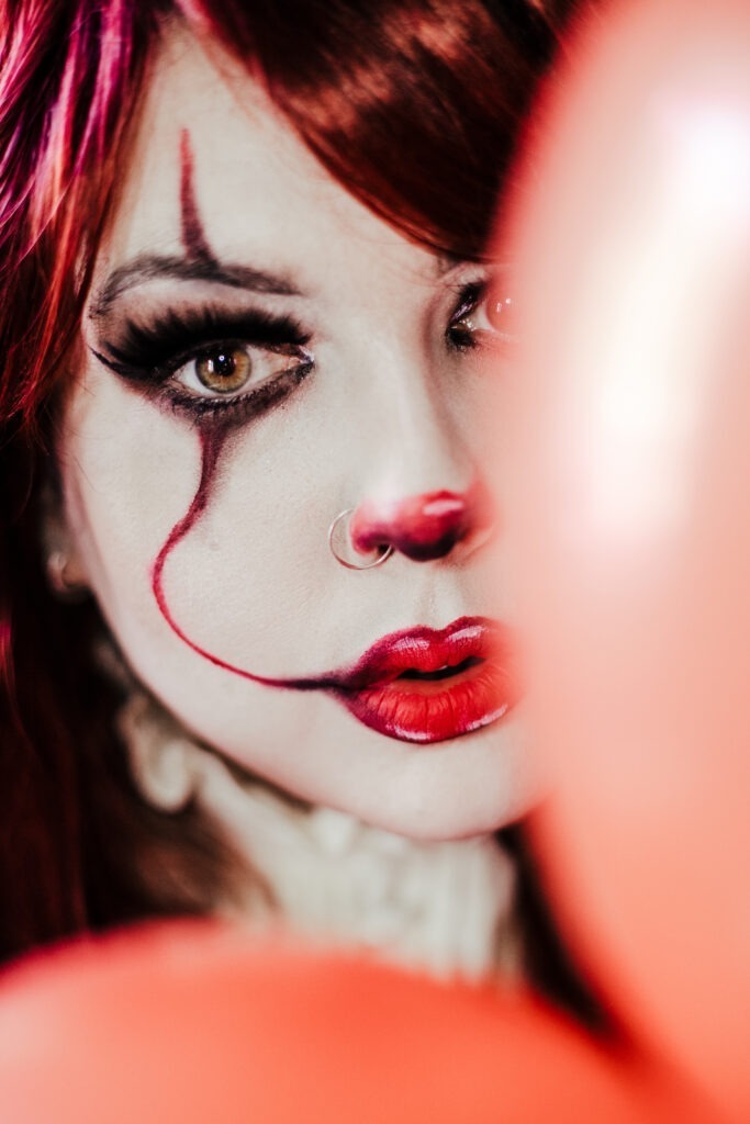 Female Pennywise from IT movie makeup & face paint. Halloween Photography