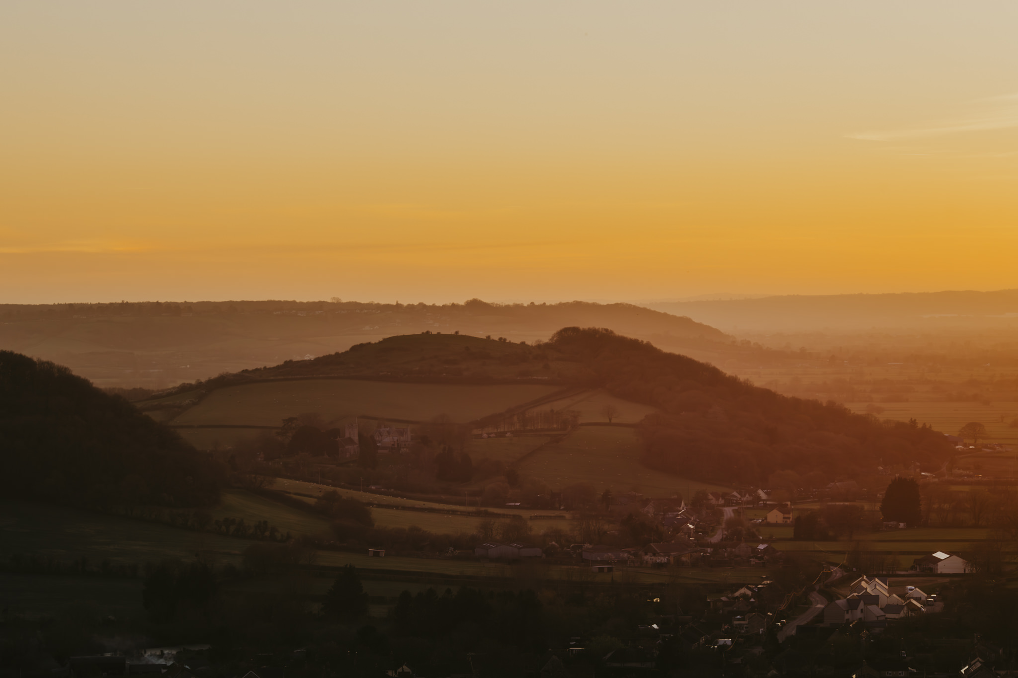 Picture of hills in the golden sunset light. 